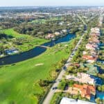 Aerial view of Ponte Vedra Beach with golf course and oceanfront homes.